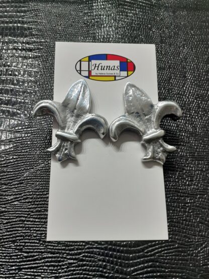 Brinco flor de lis alumínio